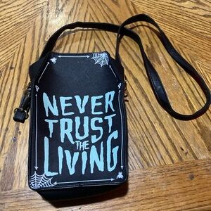“Never Trust The Living” Black Crossbody Bag